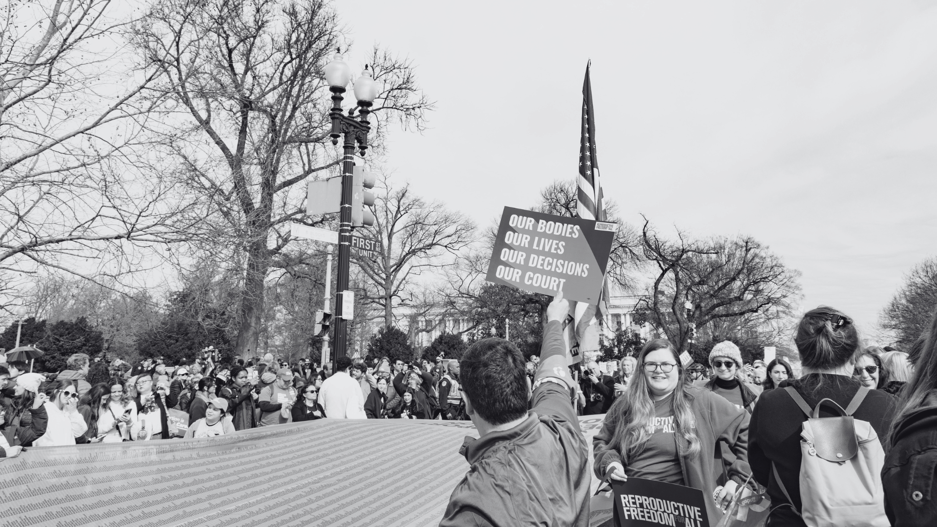 Photo of crowd of people advocating for mifepristone in front of the Supreme Court in 2024. A person holding a sign that says "Our Bodies Our Lives Our Decisions Our Courts"