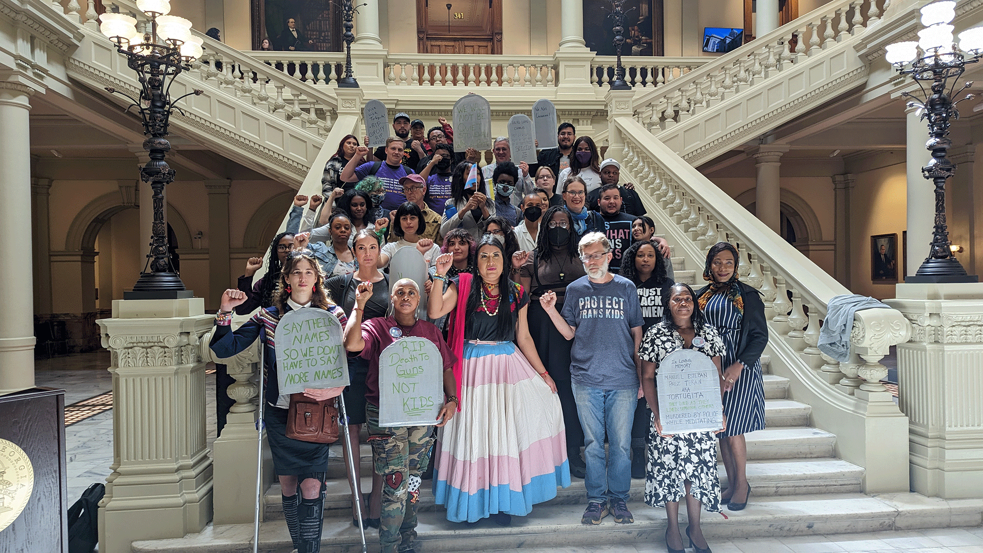 Reproductive Freedom for All Georgia members and other Georgians advocate for trans rights at the Georgia State Capitol in 2023.